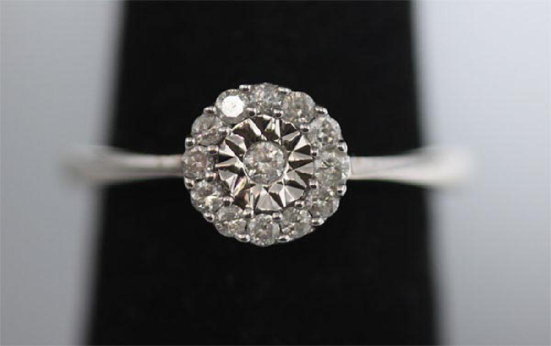 0.26 CTW DIAMOND RING .925 STERLING SILVER: 0.26 CTW DIAMOND RING .925 STERLING SILVER **|**|** 0.26 CTW DIAMOND RING .925 STERLING SILVER #IRS38904