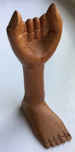 Pedro Friedeberg: Hand (fist) and foot wood sculpture by Pedro Friedeberg Measures: 3 10/16 x 2 inches Signed on bottom by artist