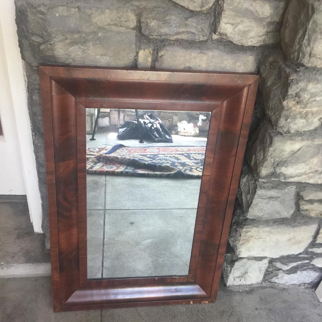 19th C. American Mahogany Grain Ogee Mirror: 19th C. American mahogany grain Ogee mirror with replaced glass, 23.5"H x 16.5"W