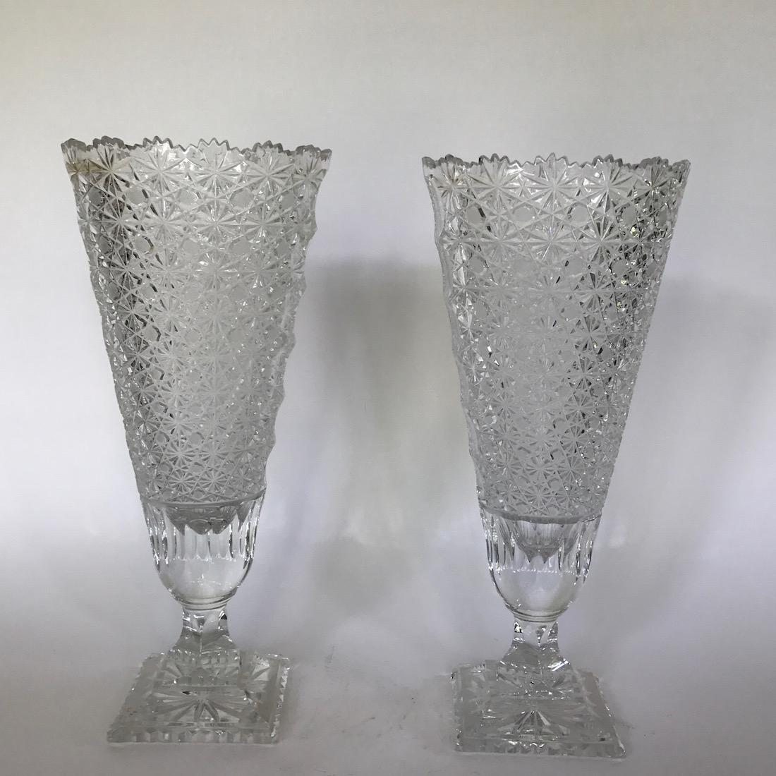Pair Tall Vintage Cut Glass Vases: Pair Tall Vintage Cut Glass Vases in flared conical shape on pedestals, star cut pattern, saw tooth edge, 17.5"H x 5" square base