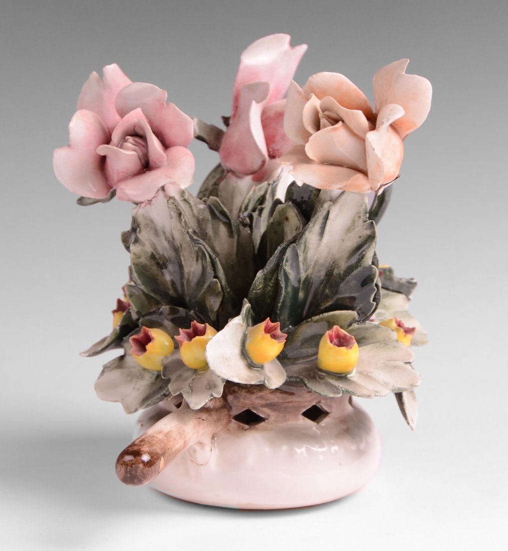Italian Porcelain Flower Sculpture Handpainted: A vintage Italian porcelain flower sculpture hand painted in warm enamels.