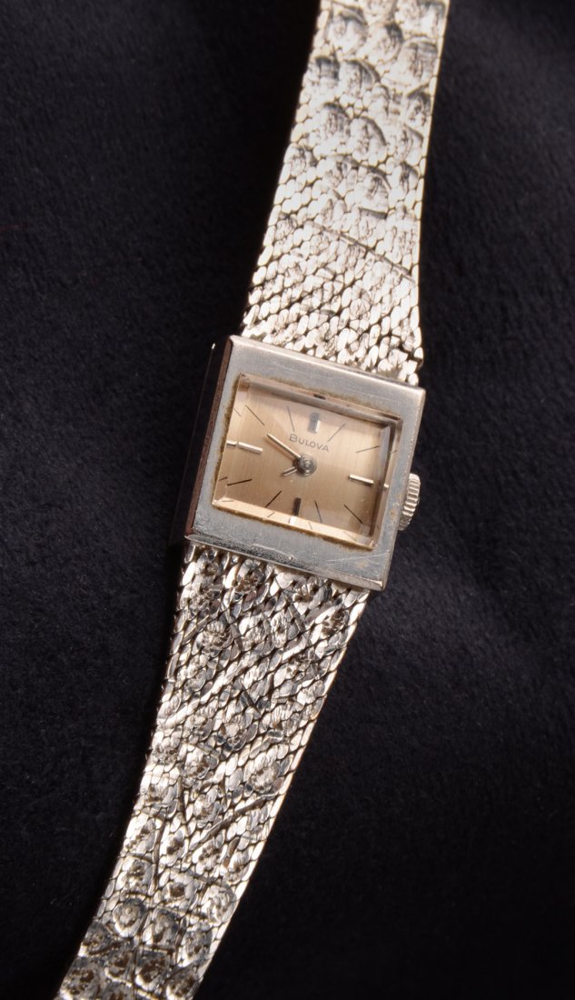 Ladies Bulova Watch: Silver band, marked as shown.