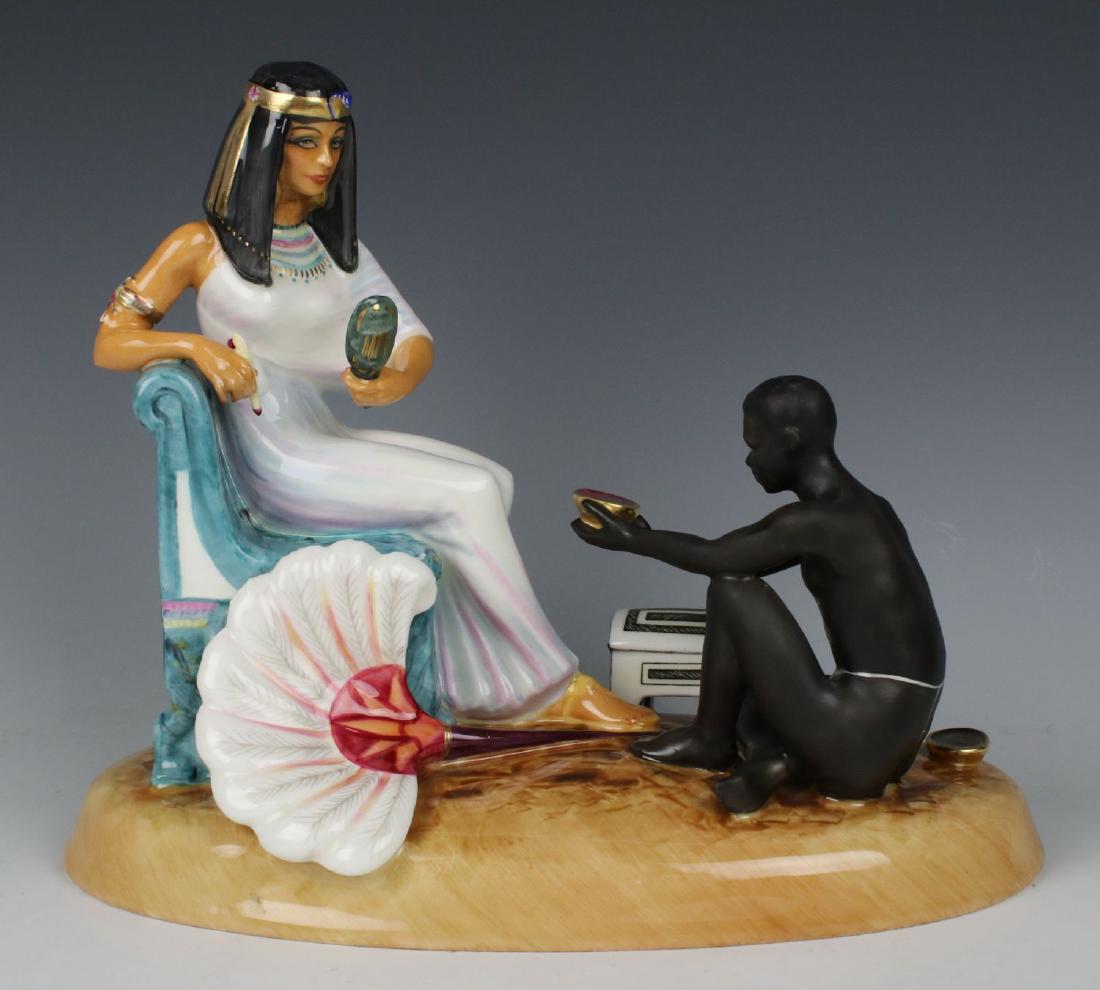 Royal Doulton Figurine HN2868 "Cleopatra": MANUFACTURE: Royal Doulton (ENGLAND) DESIGNED: M. Davies NAME: Cleopatra NUMBER: HN2868 SERIES: Les Femmes Fatales ISSUED: 1979 LIMITED EDITION: 171 of 750 CONDITION: excellent, no chips, no cra