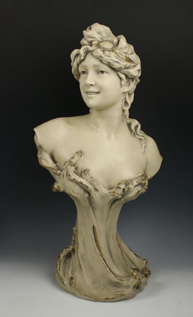 Royal Dux art nouveau figurine "Bust of Woman": MANUFACTURE: Royal Dux (Bohemia, Aistria) NAME: Bust of Woman NUMBER: 696 YEAR: 1860 - 1918 CONDITION: Excellent. No chips, no cracks. HEIGHT: 18 inch / 46 cm WIDTH: 9 1/2 inch / 24 cm DEEP: 5 1/4 inc