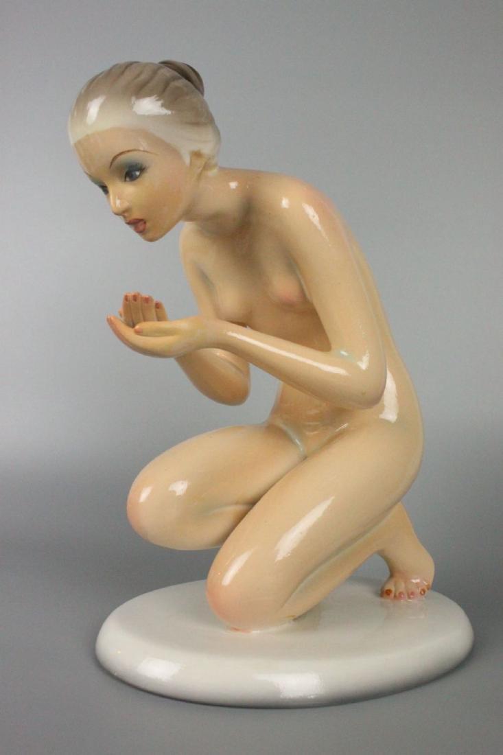 Capodimonte Ronzan Figurine Woman Drinking: MANUFACTURE: Ronzan (Italy) SCULPTOR: Ronzan (ex Lenci artist) NAME: Woman Drinking YEAR: 1950-th CONDITION: Chip under base. NO BOX. HEIGHT: 10 1/2 inch / 26 cm WIDTH: 8 inch / 20 cm DEEP: 6 inch / 1