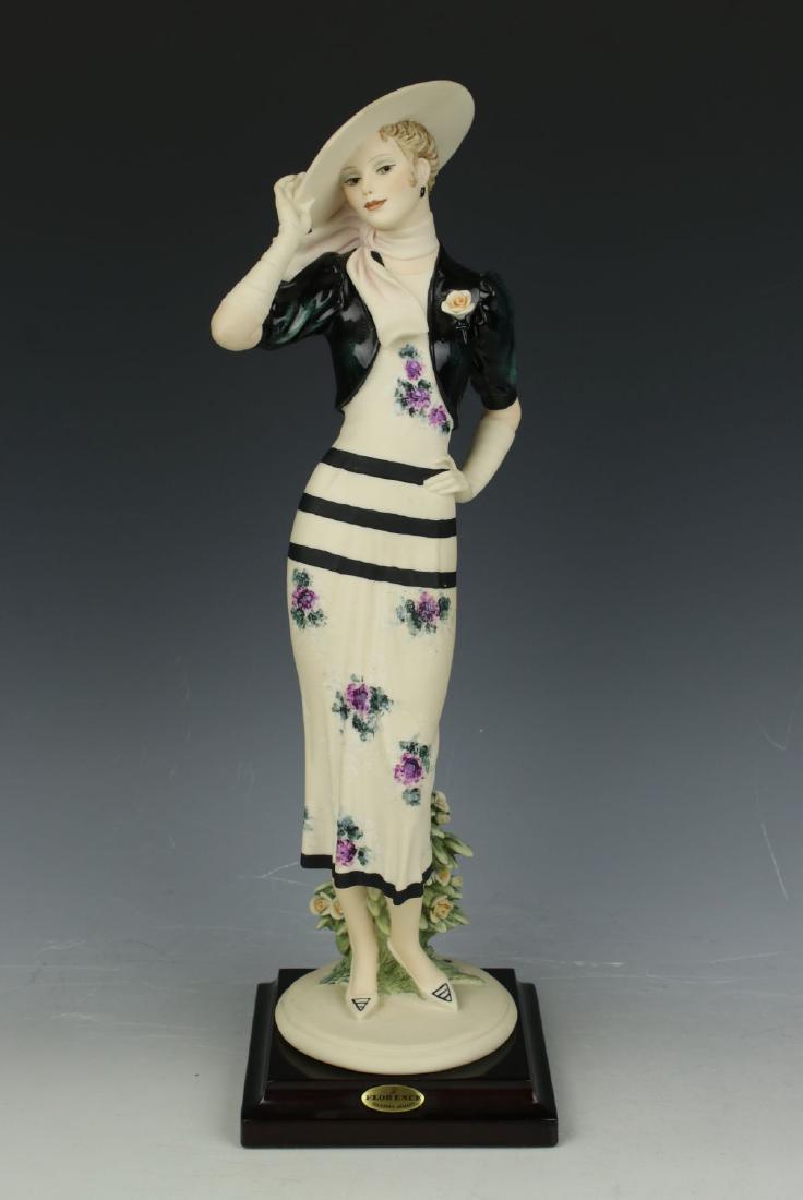 Giuseppe Armani Figurine "Tiffany": MANUFACTURE: Florence - Giuseppe Armani (Italy) NAME: Tiffany NUMBER: 1331C ISSUED: 1999 CONDITION: Excellent. No chips, no cracks. NO BOX. HEIGHT: 12 1/2 inch / 31 cm WIDTH: 3 1/2 inch / 9 cm DEEP: 3