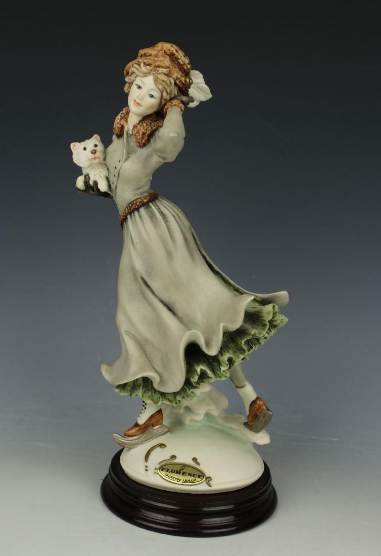 Giuseppe Armani Figurine "Winter Fun": MANUFACTURE: Florence - Giuseppe Armani (Italy) NAME: Winter Fun NUMBER: 320C ISSUED: 1997 CONDITION: Excellent. No chips, no cracks. NO BOX. HEIGHT: 10 inch / 25 cm WIDTH: 5 inch / 12 cm DEEP: 4 inch