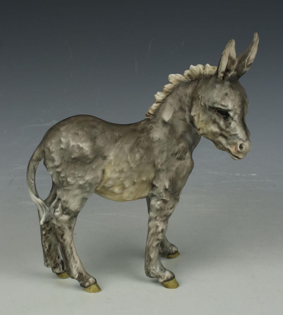 Kaiser Porcelain figurine "Donkey": MANUFACTURE: Kaiser Porcelain (Germany) NAME: Donkey SCULPTOR: - NUMBER: - CONDITION: Excellent. No chips, no cracks. NO BOX. HEIGHT: 6 1/2 inch / 16 cm WIDTH: 5 1/2 inch / 14 cm DEEP: 3 inch / 7 cm C