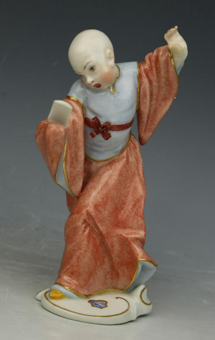 Nymphenburg figurine 287 "Chinese Boy with a Sheet of: MANUFACTURE: Nymphenburg (GERMANY) SCULPTOR: Franz Antonio Bustelli (1723-1763) in 1757 NAME: Chinese Boy with a Sheet of Music SERIES: Chinoiserie NUMBER: 287 CONDITION: Two fingers were restored. NO