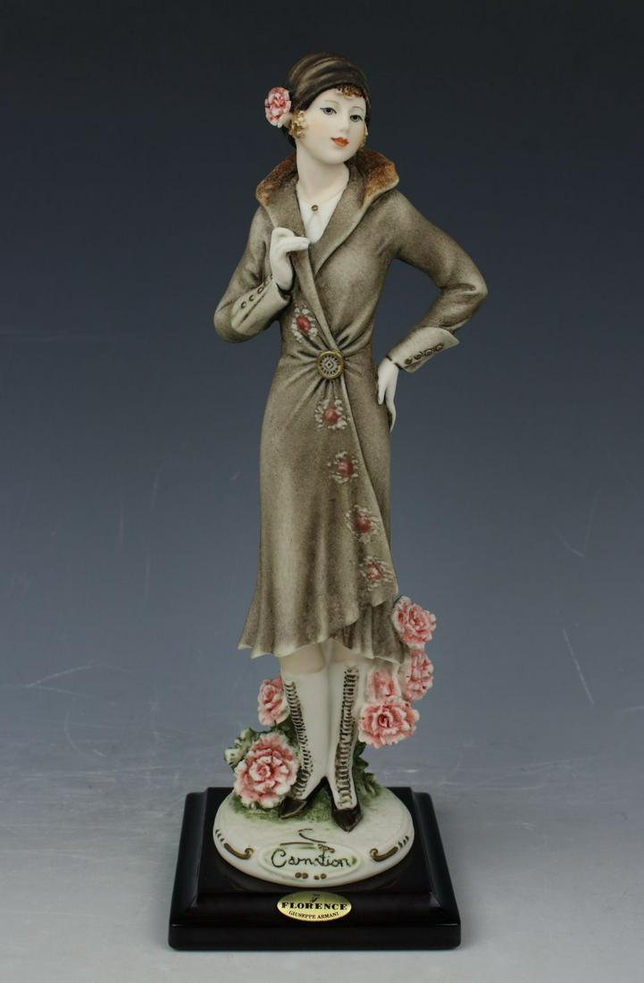 Giuseppe Armani Figurine 1247C "Carnation": MANUFACTURE: Florence - Giuseppe Armani (Italy) NAME: Carnation NUMBER: 1247C ISSUED: 1998 CONDITION: Excellent. No chips, no cracks. NO BOX. HEIGHT: 9 inch / 22 cm WIDTH: 3 inch / 7 cm DEEP: 3 inch /