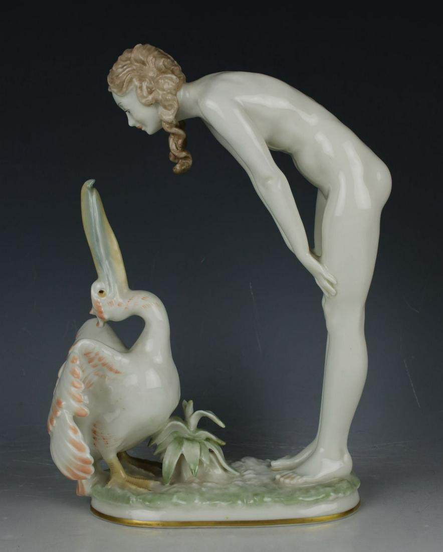 Hutschenreuther Figurine "Nude with Pelican": MANUFACTURE: Hutschenreuther (GERMANY) SCULPTOR: Carl Werner NAME: Nude with Pelican NUMBER: - YEAR: 1955 - 1968 CONDITION: Excellent. No chips, no cracks. HEIGHT: 9 inch / 22 cm WIDTH: 6 1/2 inch / 1