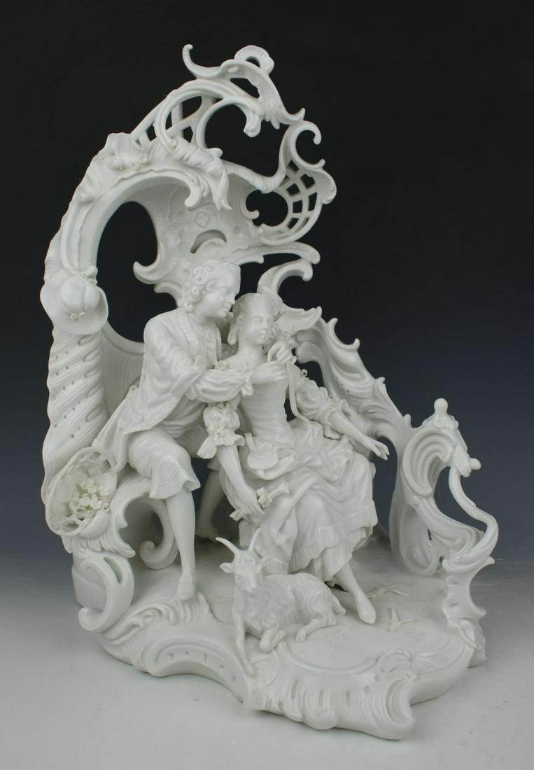 Nymphenburg figurine 51 "Courting Couple": MANUFACTURE: Nymphenburg (GERMANY) NAME: Courting Couple under Arcade NUMBER: 51 CONDITION: One finger, side of basket and foot of goat were restored. NO BOX. HEIGHT: 12 inch / 30 cm WIDTH: 9 inch / 2