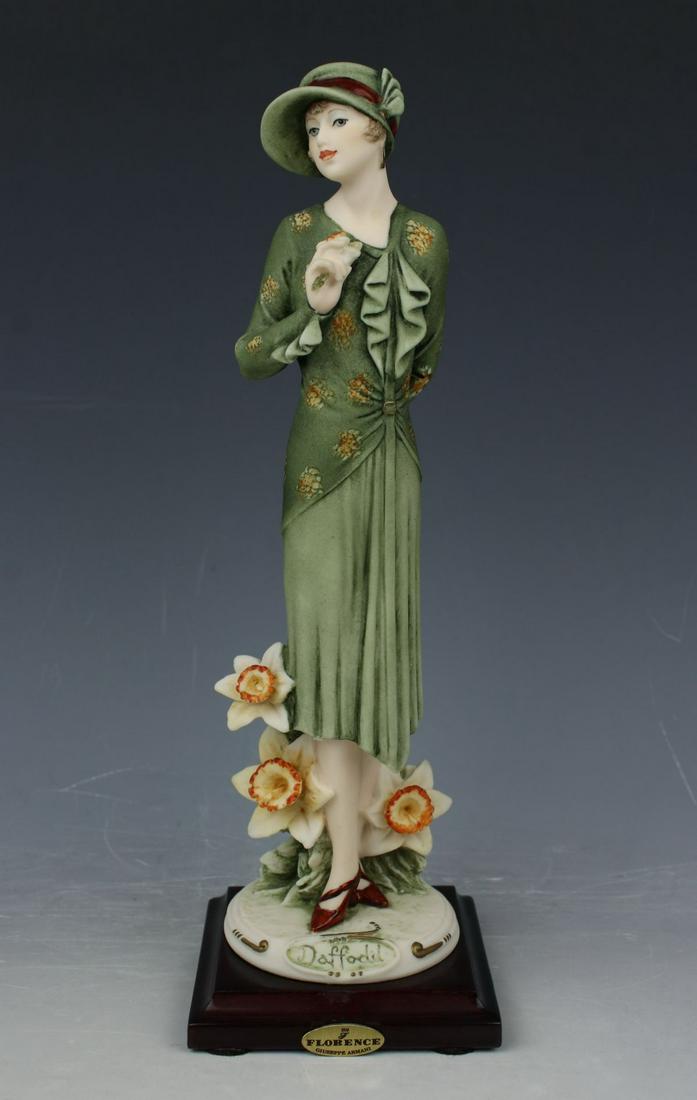 Giuseppe Armani Figurine 1245C "Daffodil": MANUFACTURE: Florence - Giuseppe Armani (Italy) NAME: Daffodil NUMBER: 1245C ISSUED: 1998 CONDITION: Excellent. No chips, no cracks. NO BOX. HEIGHT: 9 inch / 23 cm WIDTH: 3 inch / 7 cm DEEP: 3 inch /