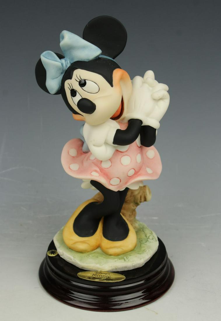 Giuseppe Armani Disney Figurine 1270C "Minnie Mouse": MANUFACTURE: Florence - Giuseppe Armani (Italy) NAME: Minnie Mouse NUMBER: 1270C ISSUED: 1998 CONDITION: Excellent. No chips, no cracks. No Box. HEIGHT: 7 inch / 17 cm WIDTH: 3 1/2 inch / 9 cm DEEP: 3