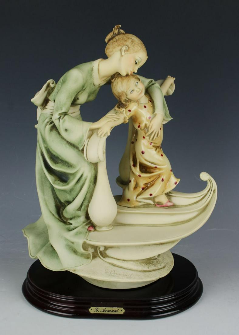 Giuseppe Armani Figurine 792C "Goodnight Kiss": MANUFACTURE: Florence - Giuseppe Armani (Italy) NAME: Goodnight Kiss NUMBER: 792C ISSUED: 1991 CONDITION: Excellent. No chips, no cracks. NO BOX. HEIGHT: 10 1/4 inch / 25 cm WIDTH: 8 inch / 20 cm DEEP