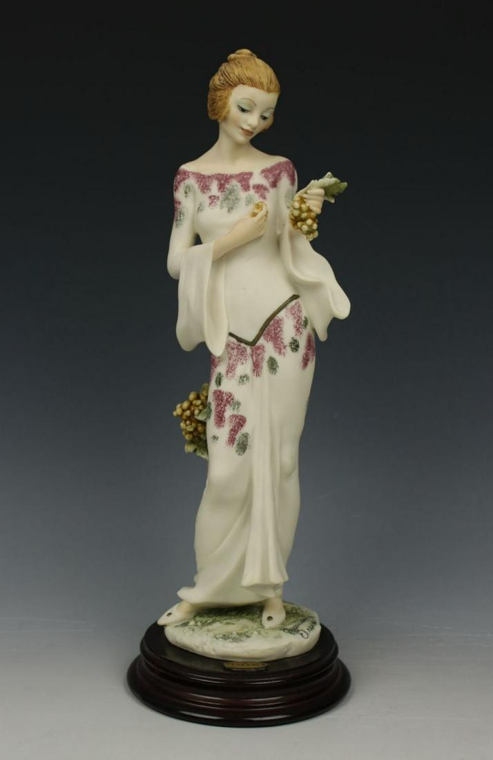 Giuseppe Armani Figurine 400C "Arianna": MANUFACTURE: Florence - Giuseppe Armani (Italy) NAME: Arianna NUMBER: 400C ISSUED: 1995 CONDITION: Excellent. No chips, no cracks. NO BOX. HEIGHT: 10 1/2 inch / 26 cm WIDTH: 3 1/2 inch / 9 cm DEEP: 3 
