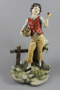 Capodimonte Luciano Cazzola figurine Boy Picking Mushrooms: MANUFACTURE: Porcellane Principe (Italy) SCULPTOR: Luciano Cazzola NAME: Boy Picking Mushrooms YEAR: 1980s CONDITION: Minor damages to leaves and flowers. NO BOX. HEIGHT: 10 1/2 inch / 26 cm WIDTH: 6