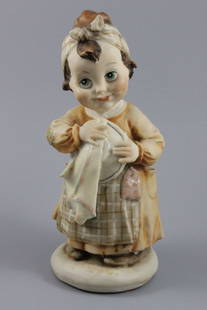 Giuseppe Armani Figurine Do you like washing dishes: MANUFACTURE: Florence - Giuseppe Armani (Italy) NAME: Do you like washing dishes? NUMBER: 3613 ISSUED: 1983 CONDITION: Perfect. No chips, no cracks. NO BOX. HEIGHT: 7 1/4 inch / 18 cm WIDTH: 3 1/4 inc