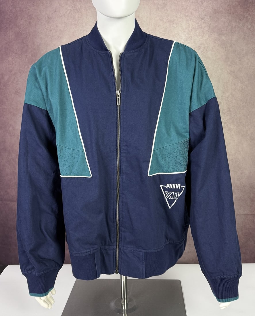 The Weeknd's Wardrobe - Puma x XO jacket: Rare Puma x The Weeknd x XO Jacket New. Noted by the consignor as new (unworn). SIZE: L CONDITION: Pre-owned. The photographs are part of this description - please review them carefully to assess cond