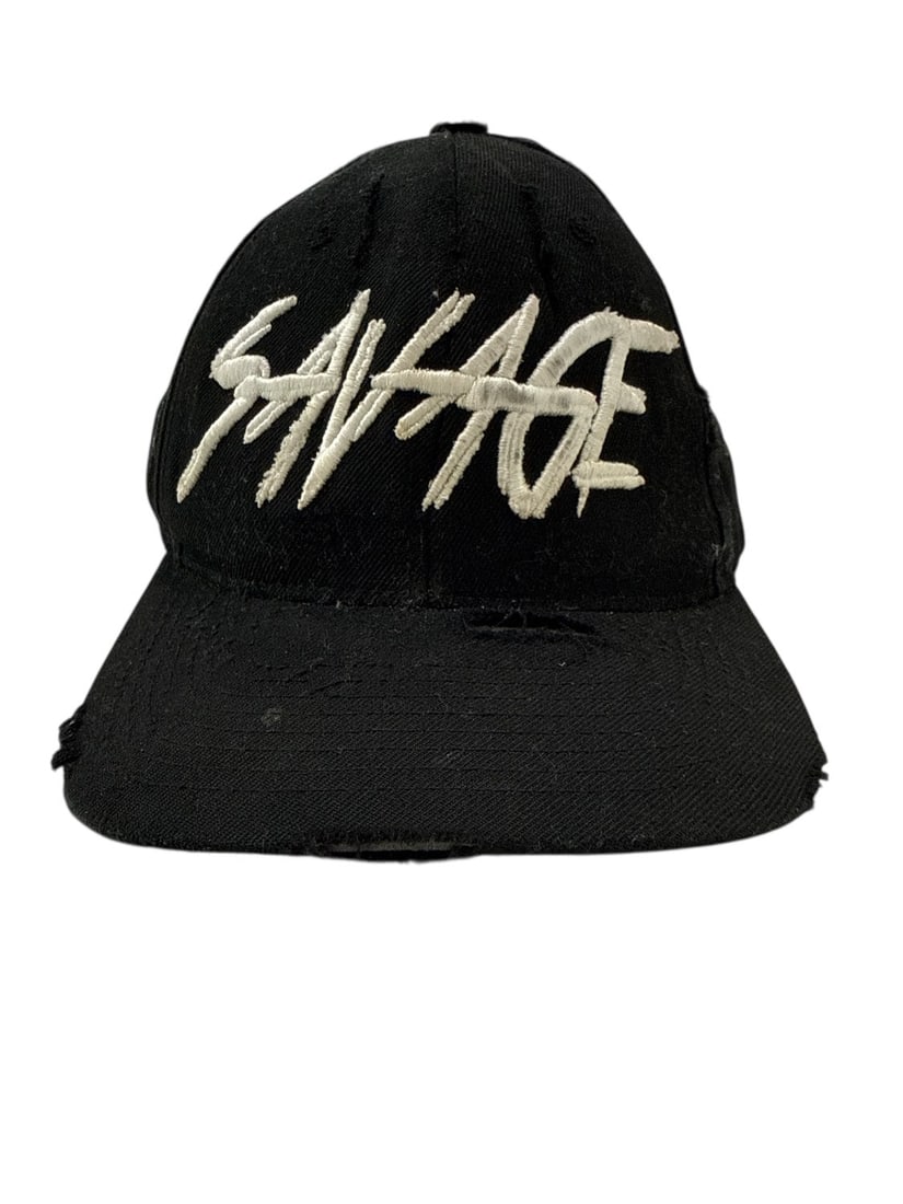 The Weeknd's Wardrobe - XO cap: The Weeknd XO Savage Cap. XO is The Weeknd's own label and lifestyle imprint, released through Republic Records. CONDITION: Pre-owned. The photographs are part of this description - please review them