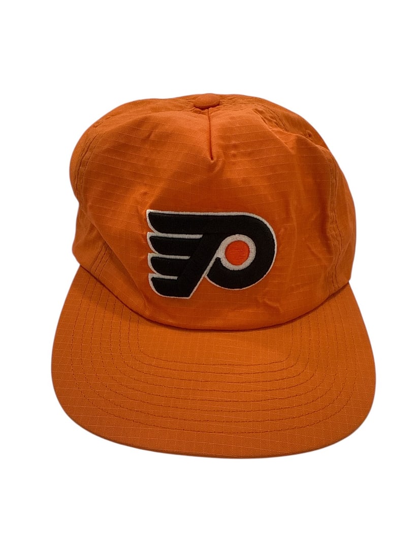 The Weeknd's Wardrobe - Mitchell & Ness cap: Mitchell & Ness Vintage Hockey NHL Nostalgia Co. Mitchell & Ness Philadelphia. P.A. Cap. CONDITION: Pre-owned. The photographs are part of this description - please review them carefully to assess con