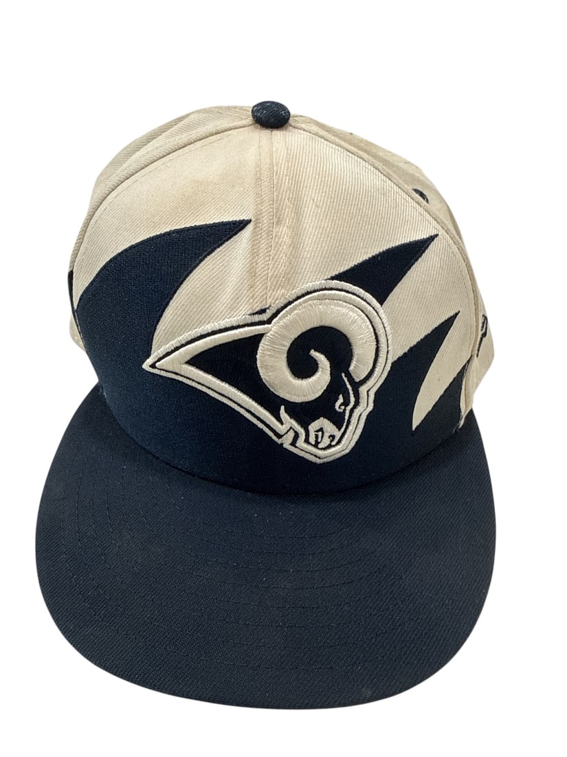 The Weeknd's Wardrobe - New Era cap: NFL New Era Cap. Noted by the consignor as new (unworn). CONDITION: Pre-owned. The photographs are part of this description - please review them carefully to assess condition. PROVENANCE: From the per