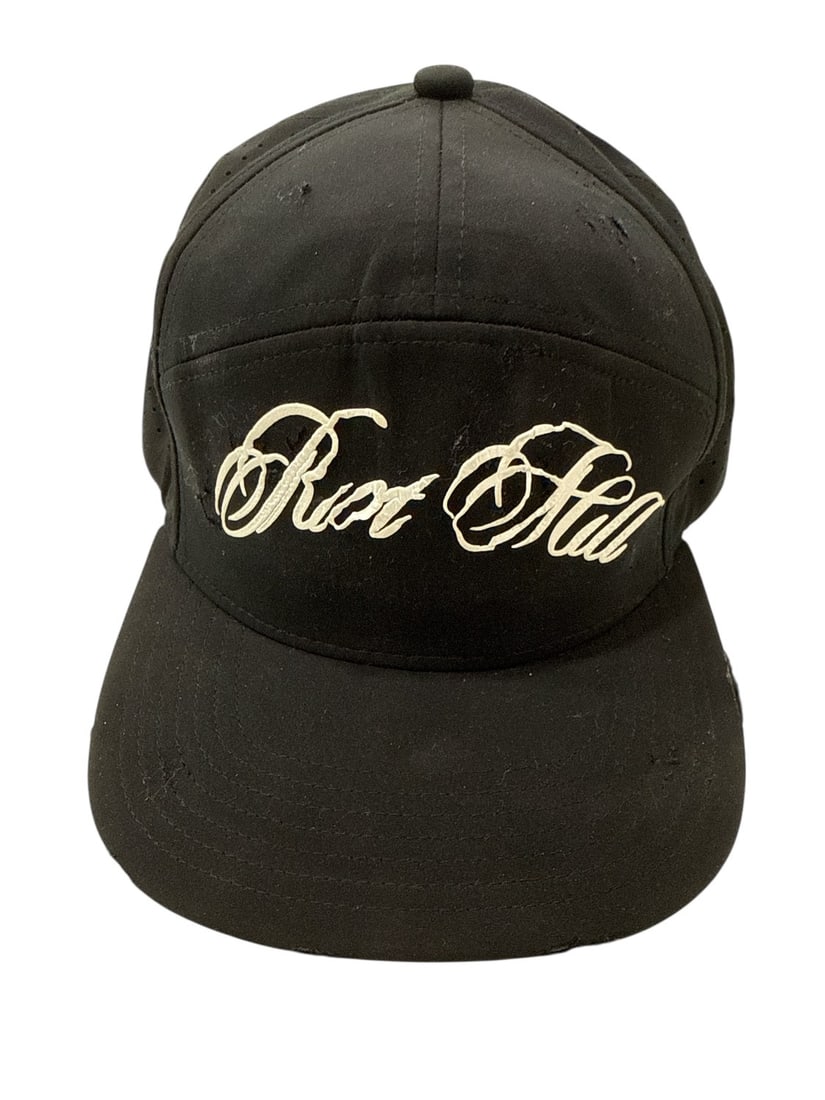 The Weeknd's Wardrobe - Riot Hill cap: Riot Hill Cap. CONDITION: Pre-owned. The photographs are part of this description - please review them carefully to assess condition. PROVENANCE: From the personal collection of Abel Makkonen Tesfaye,