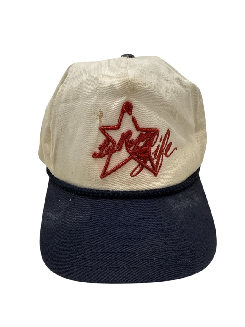 The Weeknd's Wardrobe - La Ropa cap: La Ropa Cap. CONDITION: Pre-owned. The photographs are part of this description - please review them carefully to assess condition. PROVENANCE: From the personal collection of Abel Makkonen Tesfaye, p