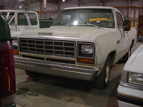 1981 DODGE RAM 150 PICKUP: 1981 Dodge Ram 150 Pickup, 2-door, VIN: 1B7FD14P9BS157402, Mileage: 187280, White, 8-cyl, standard, tires fair. Exterior condition fair, scratched. Interior condition fair, worn, torn. Paint faded. UP