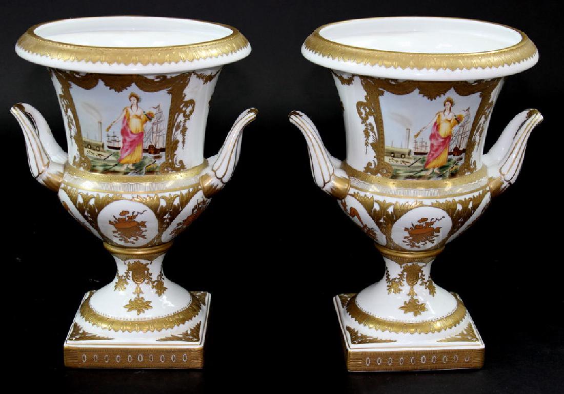 VINTAGE LIMOGES PORCELAIN URNS: Vintage Limoges porcelain urns. Featuring a nude women in front of harbor. Floral design on opposite side. Measures 14" H x 10-1/2" W. Shipping $154.