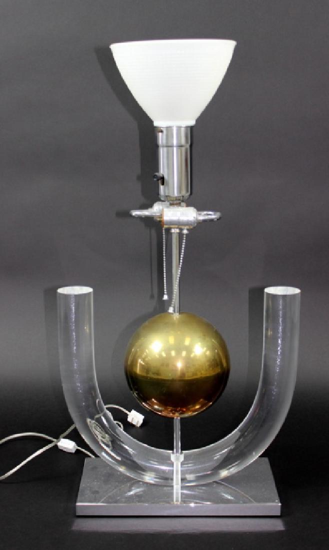 VINTAGE MCM BRASS CHROME & LUCITE LAMP: Vintage mcm brass chrome and lucite lamp. Possibly Karl Springer. Measures 30-1/4" H x 16-1/8" W. Shipping $125.