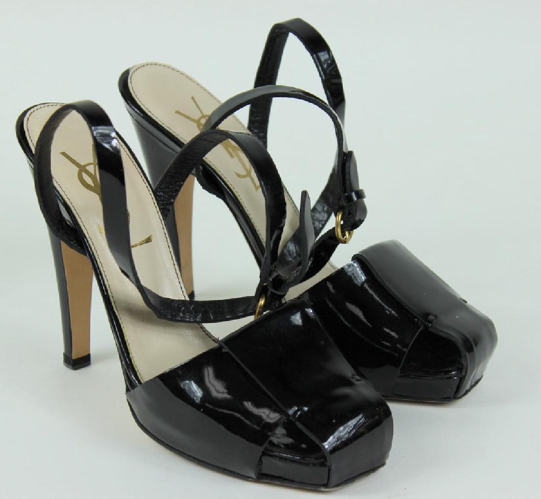 Yves Saint Laurent Black Heels: These Ladies Yves Saint Laurent Black Heels are size 37.5 (7.5). Made in Italy. Color: Black. Ankle Strap, Moon Calf. See Photos.