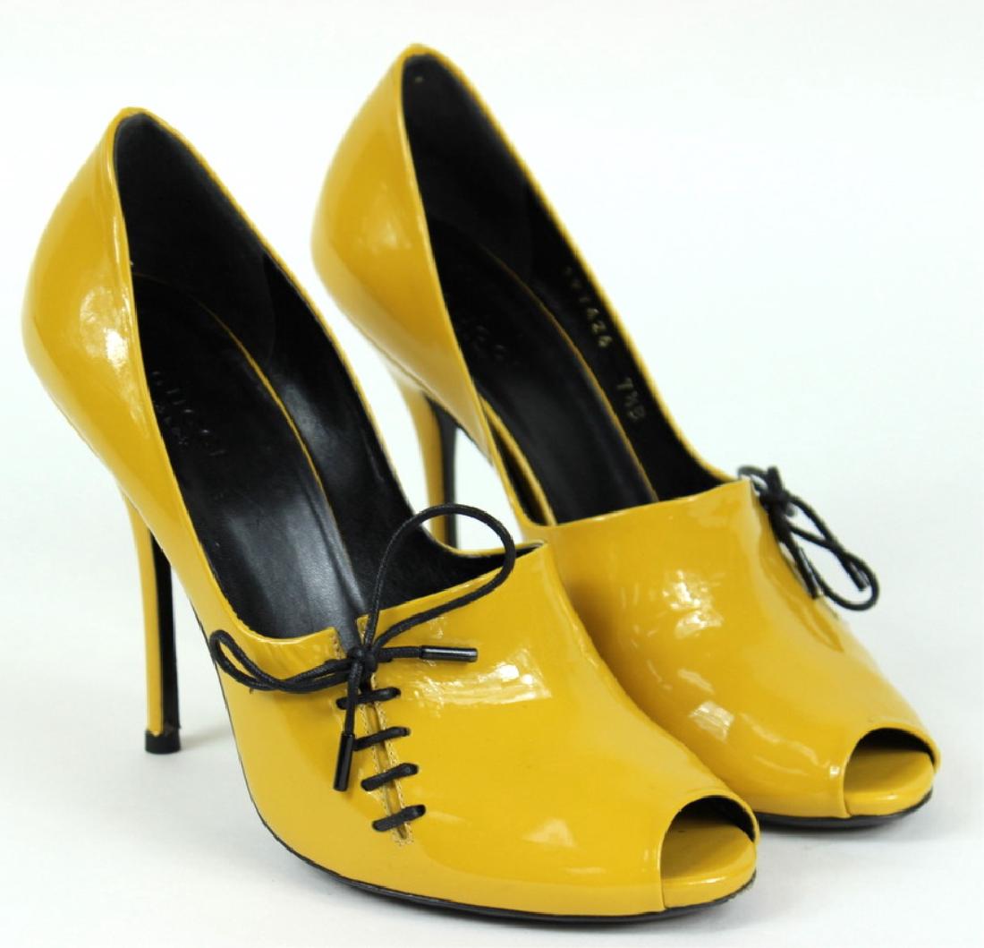 Gucci Heels Yellow Size 7.5: Ladies Gucci Heels Made In Italy, Heel color is yellow with black leather on inside with serial number reading 197426. These Retail for $765 Great condition, like new. See photos