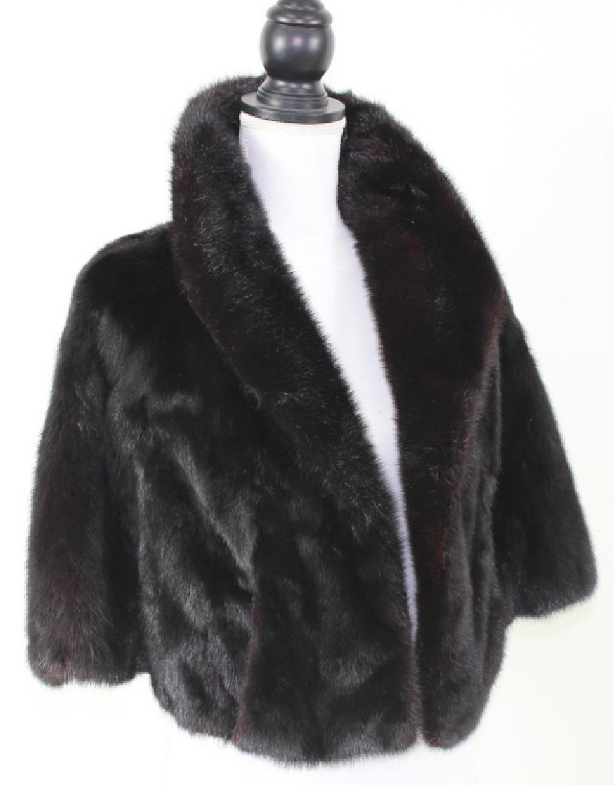 Mink Coat: Black Mink Coat. Furs by Henri , Brooklyn New York. Coats approximate length is 18 inches. Approximate width is 21 inches. See photos