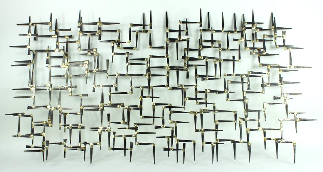 MODERN 3-D METAL SCULPTURE: MODERN 3-D METAL SCULPTURE. 25 inches high x 50 wide x 3 deep.