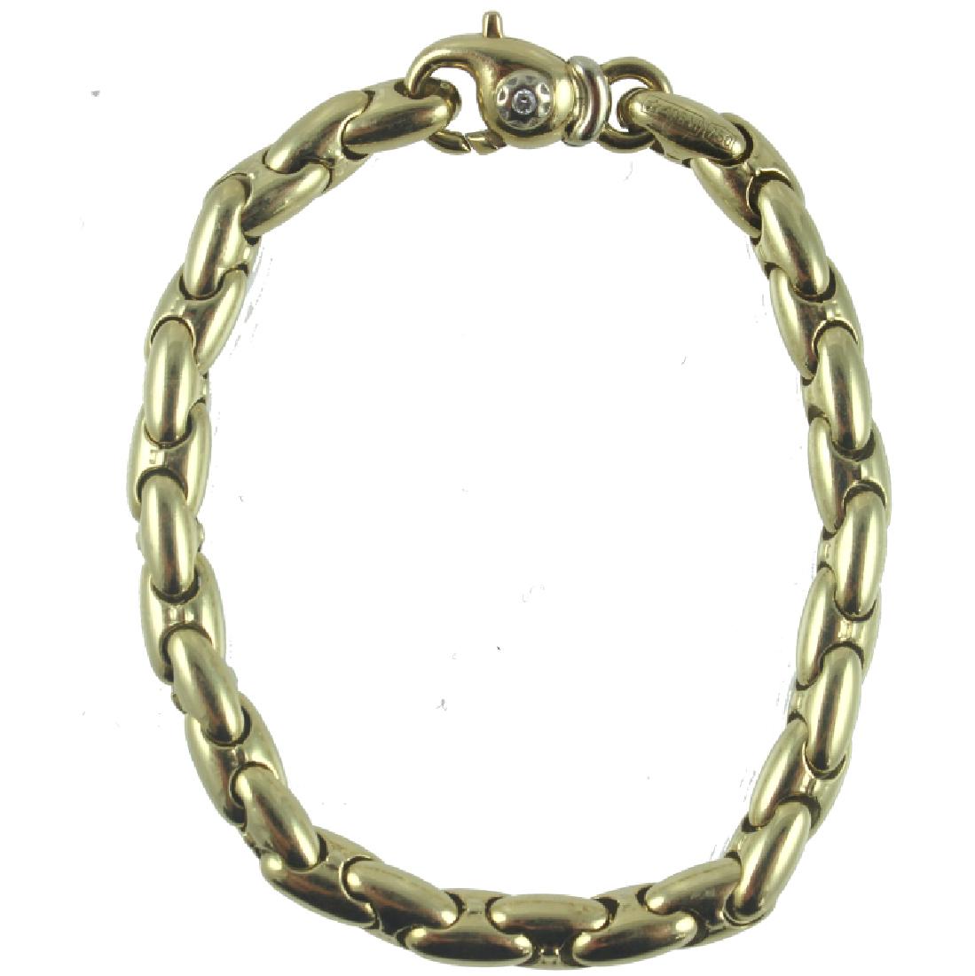 18K CHIMENTO DESIGNER BRACELET: 18K CHIMENTO DESIGNER BRACELET. Measures 7 1/2 inches long. Diamond in clasp. Total Weight 12.2 DWT.