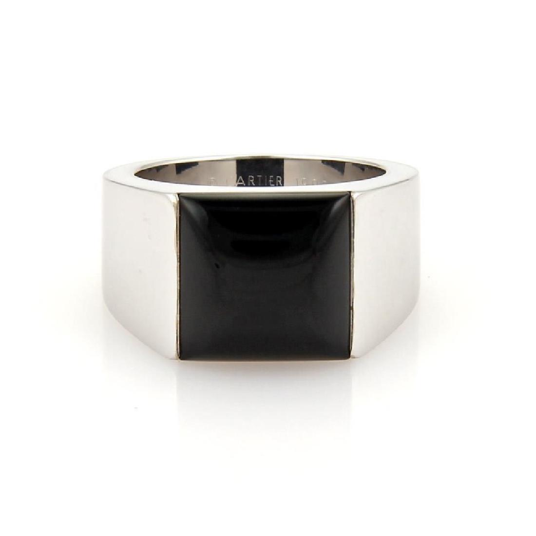 CARTIER 18K ONYX MENS RING: This elegant ring is from the tank collection by Cartier it is crafted in solid 18k white gold with a fine polished finish and boast a square shaped top with a high polished black onyx gemstone set in