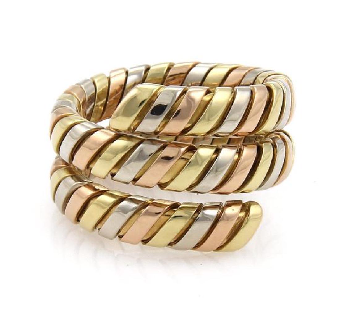 Bvlgari Bulgari Tubogas 18k Gold Wrap Band Ring: Bvlgari Bulgari Tubogas 18k Tricolor Gold Wrap Band Ring Size 8.5 This authentic Bvlgari piece is finely crafted from 18k yellow, white and rose gold. It comes from Bvlgari's Tubogas collection. It fe