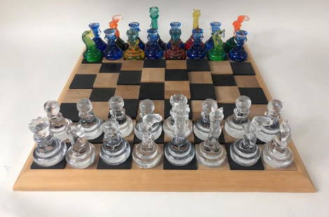 Rare Kosta Boda Blown Art Glass Designer Chess Set: Kosta Boda contemporary clear & multi-colored hand blown chess designed by Kjell Engman. Limited edition exclusively for Neiman Marcus. One of only 250 handmade Kosta Boda chess sets. Each piece is