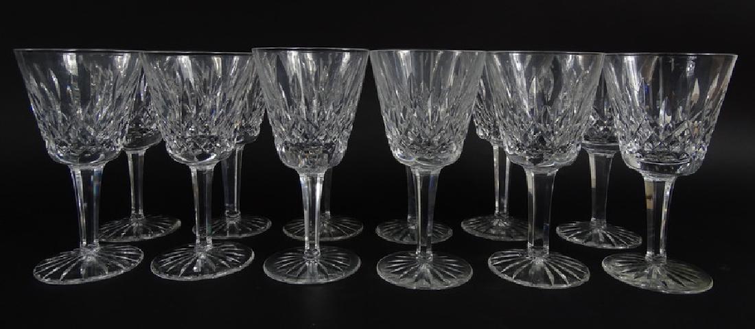 12 Waterford Lismore Cut Crystal Claret Wines: Lot of twelve (12) Waterford "Lismore" cut crystal claret wine glasses. Waterford acid etch signature to each base. Each measures 5-7/8" H x 3" in Diameter. Overall Good Condition. From a Boca Raton e