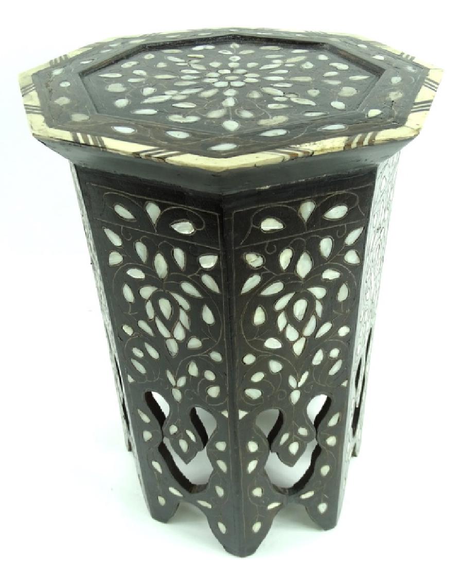 19th/20th C. Mother of Pearl Inlaid Garden Seat: Antique octagonal hand carved wooden garden seat designed with intricate mother of pearl inlay leaf motif & carved bone boarder. Measures 19-1/2" Tall x 13" Wide. From a Key Biscayne estate. Local Pic