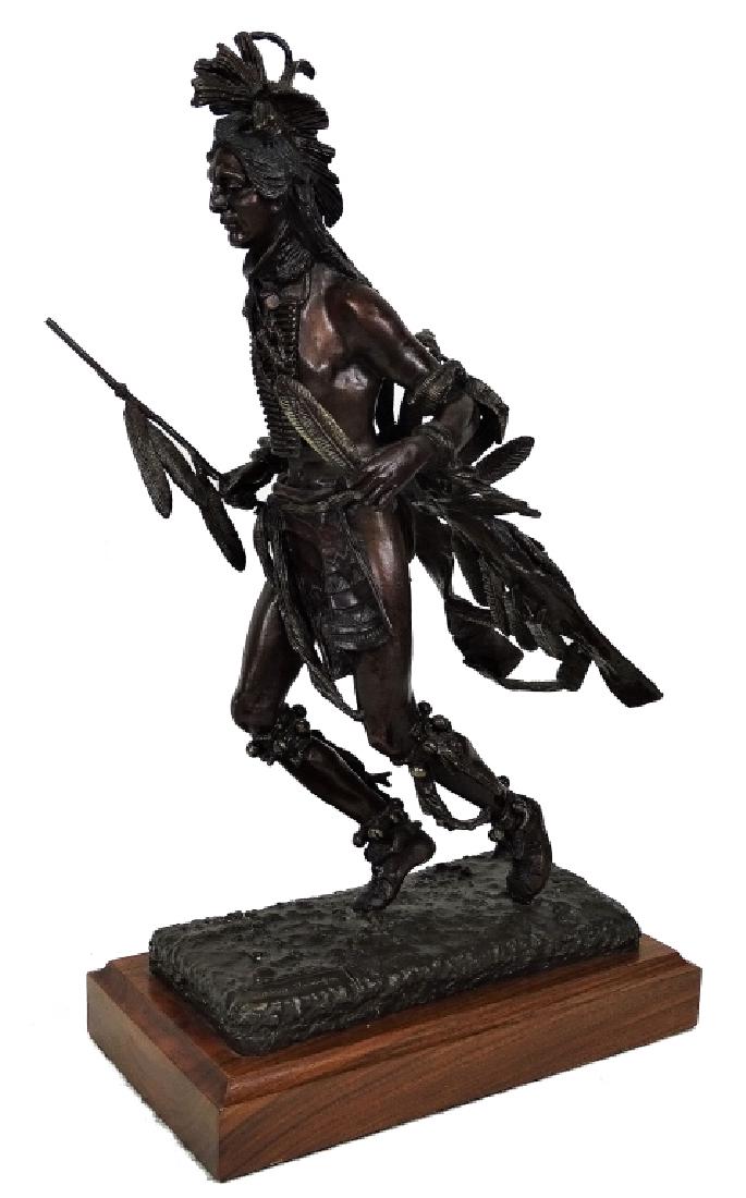 Frederic Remington Bronze Medicine Man Sculpture: After Frederic Remington (American: 1861 - 1909) Rare western bronze sculpture of a Native American Indian medicine man mounted atop a wooden base. Signed "Frederic Remington" to base. Measures: 12-1/