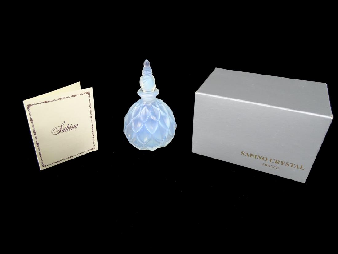 Sabino Perfume Bottle "PETALIA": SABINO PERFUME BOTTLE "PETALIA" Floral stopper, above a baluster body decorated with petals, in opalescent glass, signed in script Sabino, Paris Features original box and paperwork.