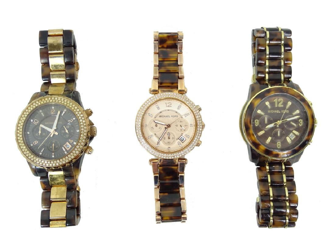 Three Michael Kors Ladies Wrist Watch: Three Michael Kors Ladies Wrist Watch Case width: 40MM Model number: MK-5416 Type: Wrist watch Brand: Michael Kors Model name: Madison chronograph Weight: 61.5 Bracelet length: 9" Movement type: Quart