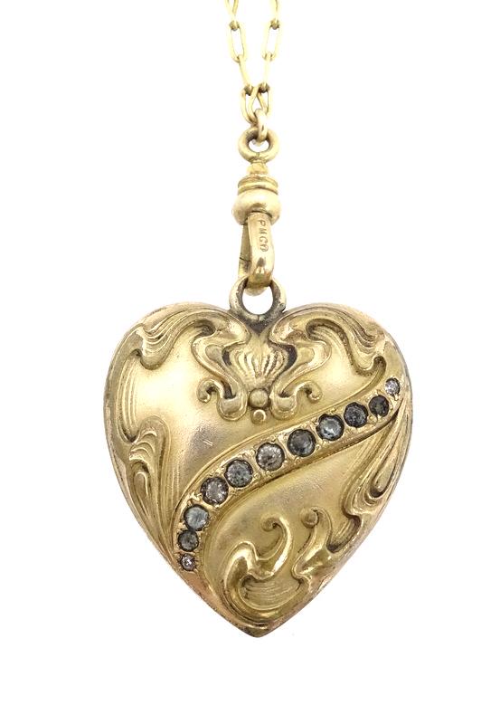 10K Heart Locket with necklace: 10K Heart Locket with necklace. Total Weight 12.2 dwt.