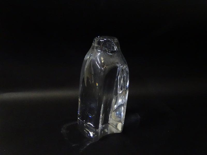 A Baccarat Penguin Sculpture: A Baccarat Penguin Sculpture. Measures 7 inches high.