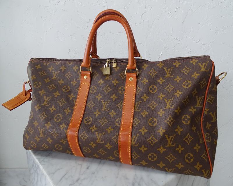 Louis Vuitton Paris France Tote Handbag: Louis Vuitton Paris France Tote Handbag. Measures 17 inches high x 23 inches wide.