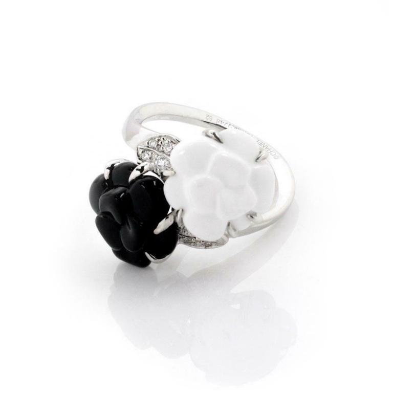 Chanel Diamonds Carved Onyx & Agate 18k W Gld Ring: This is an elegant authentic ring from Chanel's popular Camelia collection and features a gorgeous black and white camellia flower carved from one piece of polished black onyx stone and one piece whit