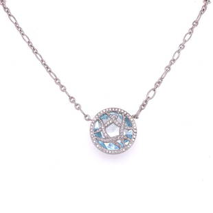 Mimi So Aquamarine Diamond Pendant Necklace: Fabulous aquamarine diamond pendant fashioned in 18 karat white gold. The round faceted aquamarine weighs approximately 15.5 carats and is overlayed with round brilliant cut diamonds weighing approxim