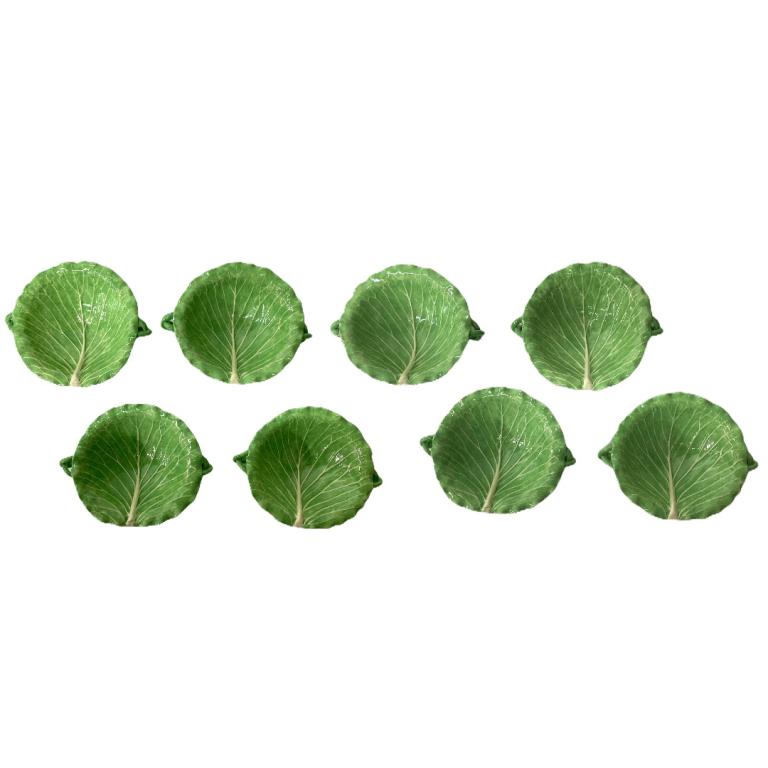 (8) Eight Dodie Thayer Lettuce Cups/Bowls: (8) Eight Dodie Thayer Lettuce Cups/Bowls. Measures 2 inches high x 7 1/2 inches diameter. These sit nicely on the other plates being offered.